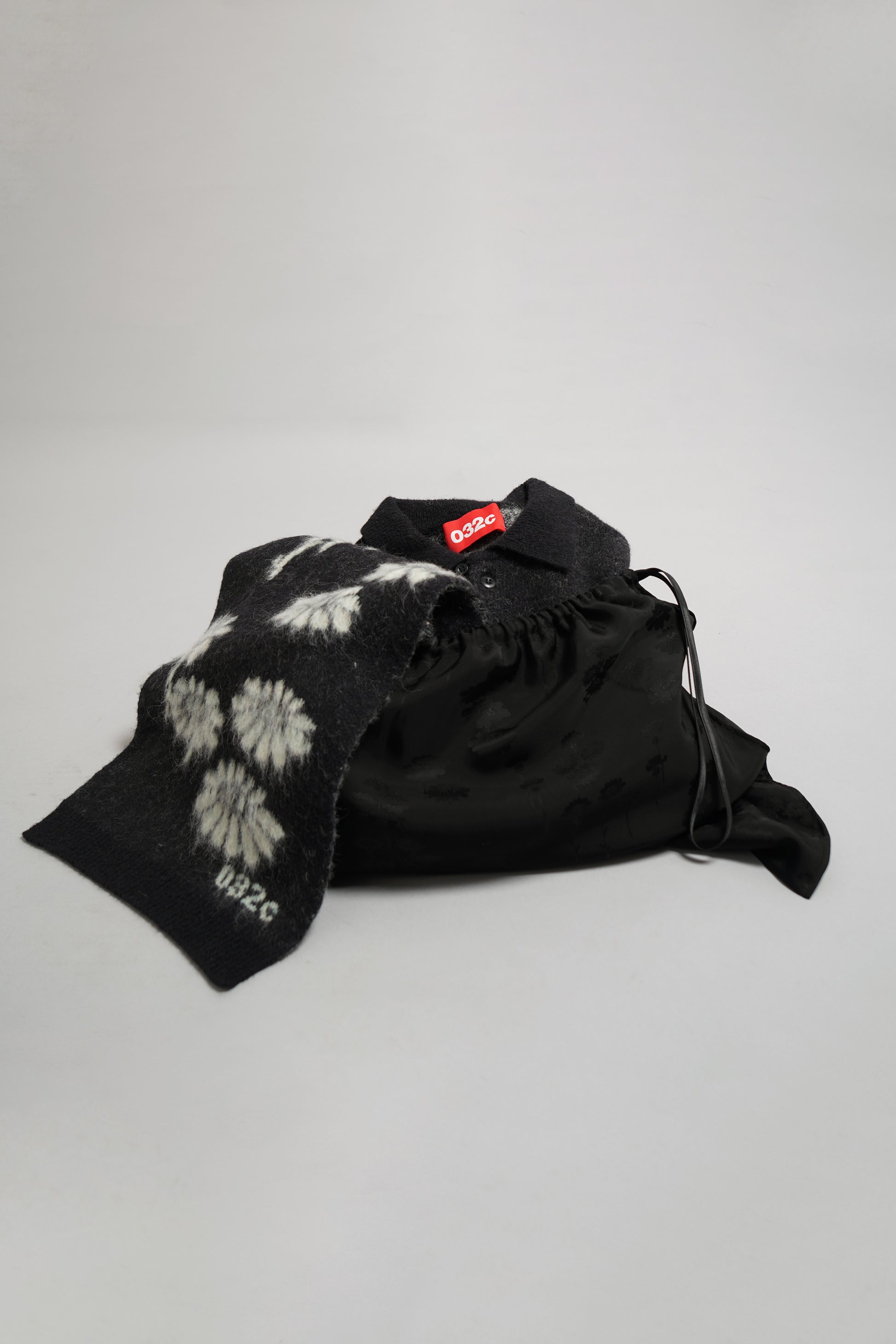 "MELTING DAISIES" KNIT LS POLO SHIRT